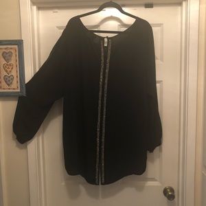 Back detail black shirt with arm cut outs Torrid 2